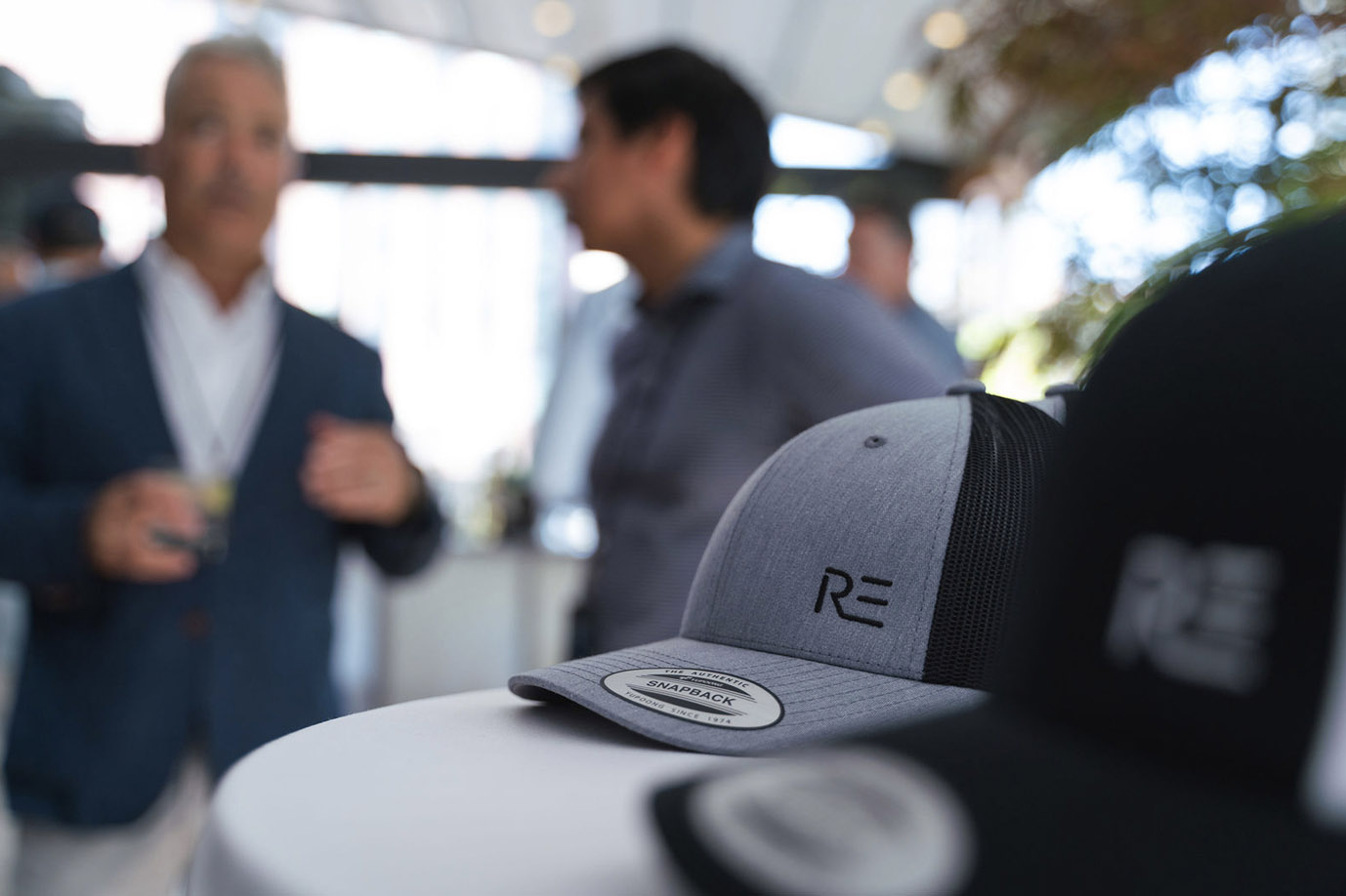 Branded Rembrand cap displayed during the event